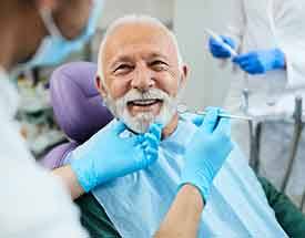 Man smiling in the dental chair