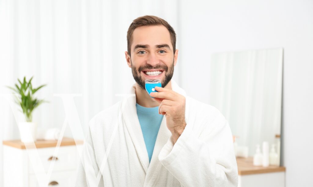 Try custom take-home teeth whitening trays.